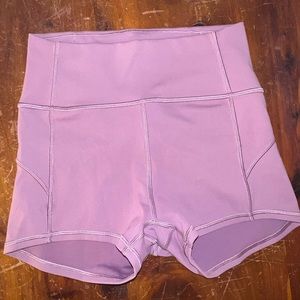Lululemon shorts size 2 in a mauve color, great condition look brand new!